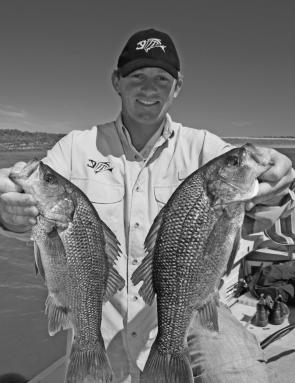 Michael Pascoe with two of his winning bass.